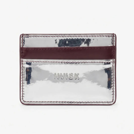 A small metallic silver card holder with a burgundy leather band, featuring the brand name 'HVISK' debossed on the front, set against a plain white background.
