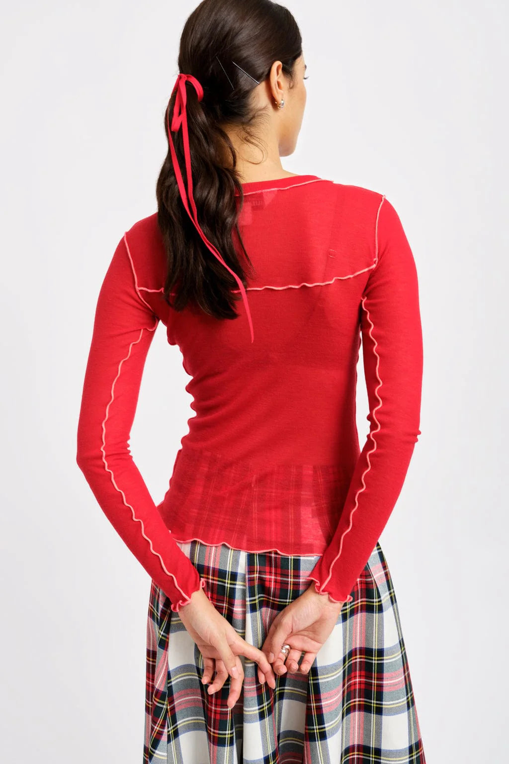 Delia Top, Red