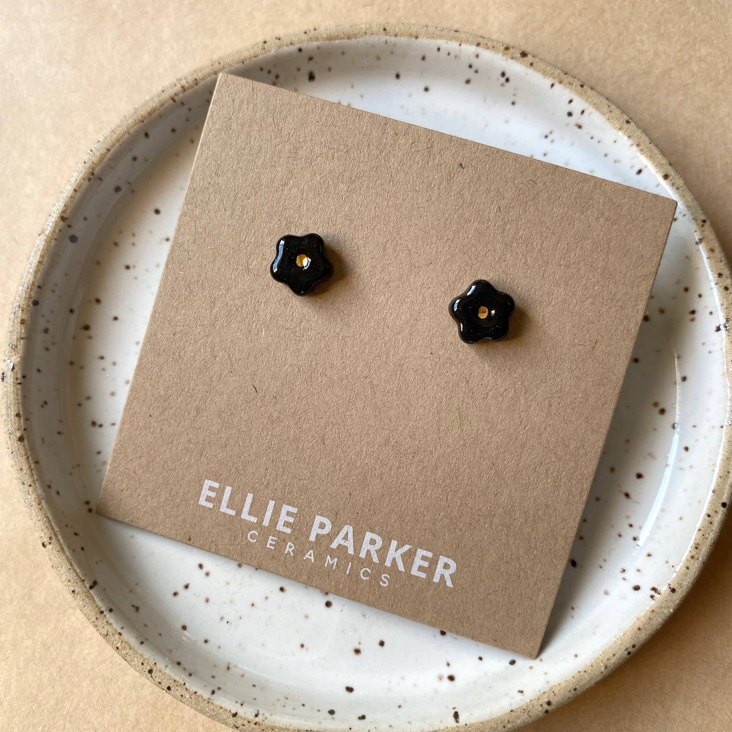 Ellie Parker, Black Ceramic Flower Gold Accent Stud Earring