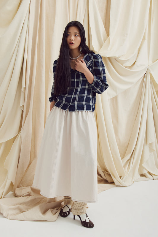 Eve Gravel, Lucila Top